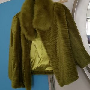 A faux fur jacket more like a lime green.